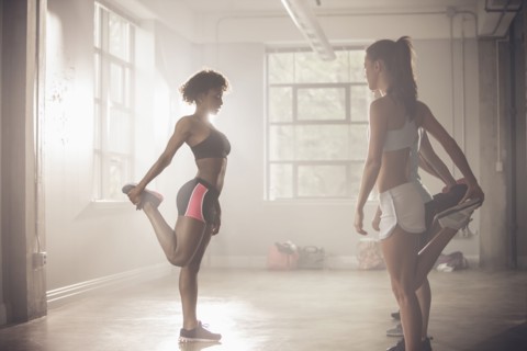 Women stretching in gym