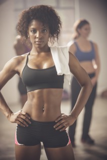 Woman standing in gym