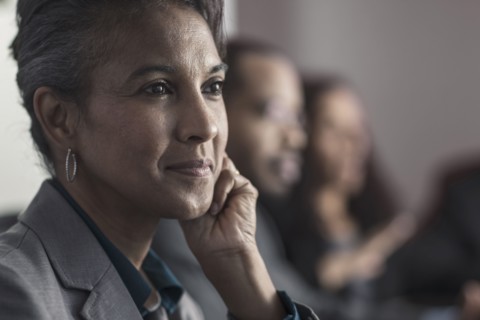 Businesswoman smiling in meeting