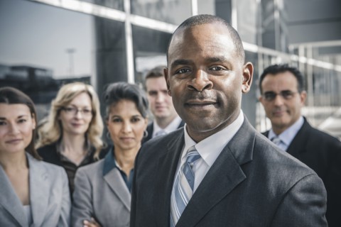 Business people smiling outdoors