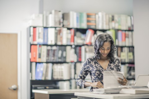 African American businesswoman working in office