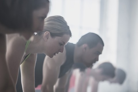 Close up of athletes looking down