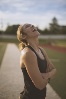 Caucasian athlete standing on sports field