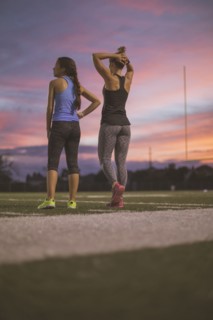 Athletes resting on sports field
