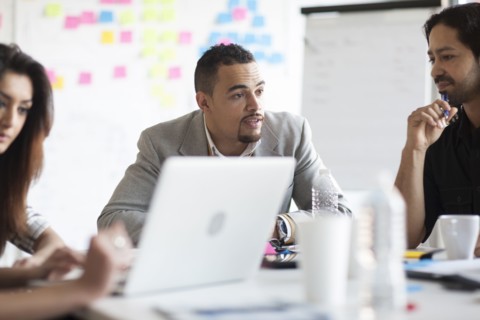 Business people talking in office meeting