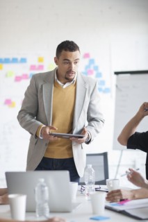 Businessman talking in office meeting