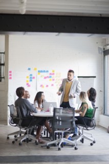 Business people talking in office meeting
