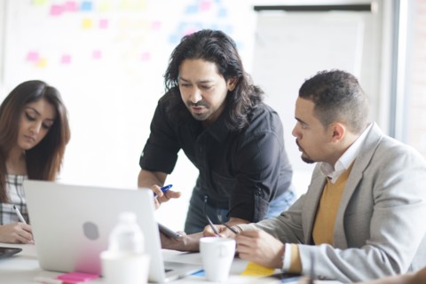 Business people talking in office meeting