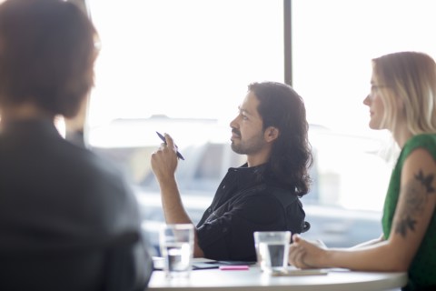 Business people talking in office meeting