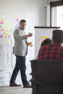 Businessman talking in office meeting