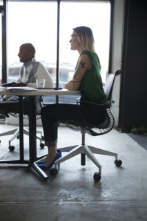 Business people listening in office meeting
