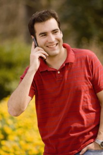 Hispanic man talking on cell phone