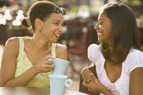 African mother and daughter laughing