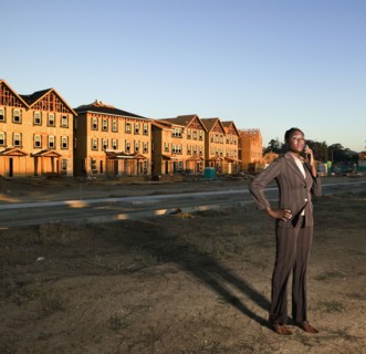 African American businesswoman at residential construction site
