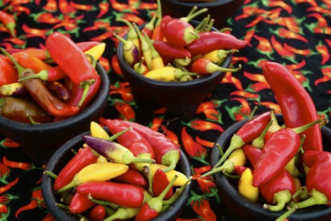 Bowls of yellow and red peppers