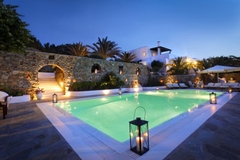 Illuminated swimming pool at night