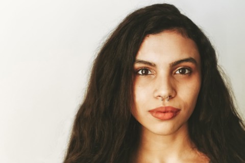 Portrait of mixed race woman with nose ring