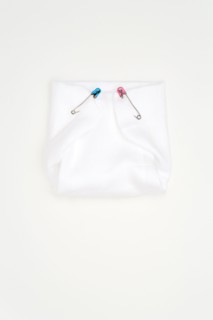 Old-fashioned pins in cloth diaper