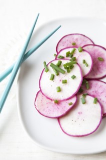 Sliced radishes on plate