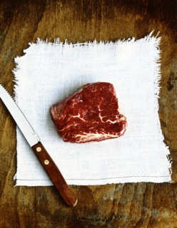 Raw beef and knife