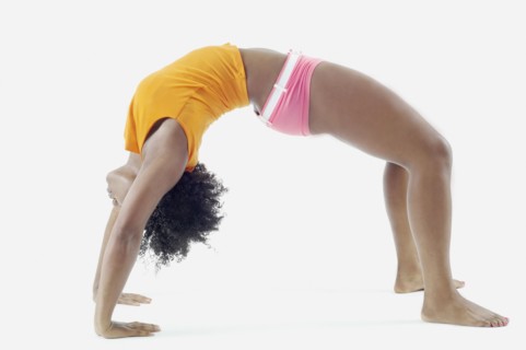 Woman in crab walk position