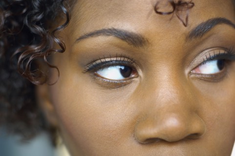 Close up of African woman looking sideways