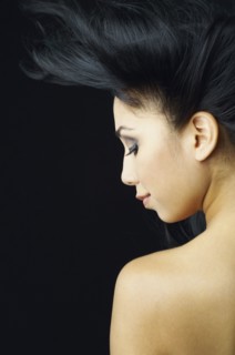 Hispanic woman with hair blowing