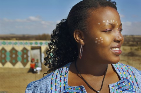 African woman with paint on face
