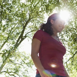 Hispanic woman in sunlight