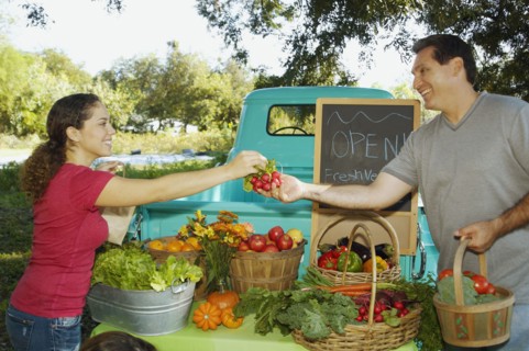 Hispanic couple at organic farm stand