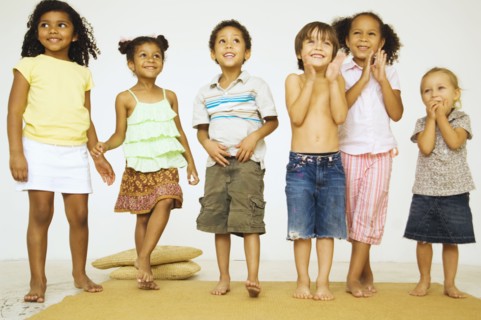Multi-ethnic children looking excited