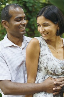 Indian couple hugging outdoors