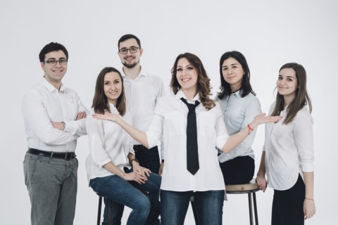 Portrait of confident Caucasian men and women
