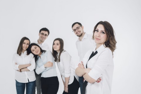 Portrait of confident Caucasian men and women