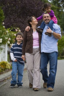 Family walking on residential street