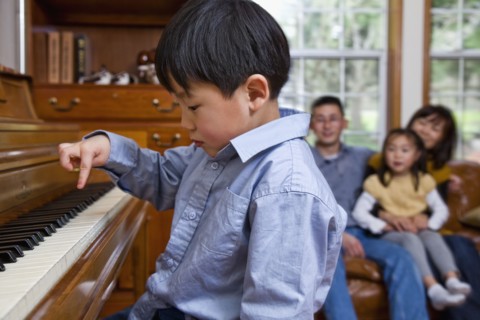 Korean boy playing piano