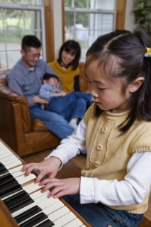 Korean girl playing piano