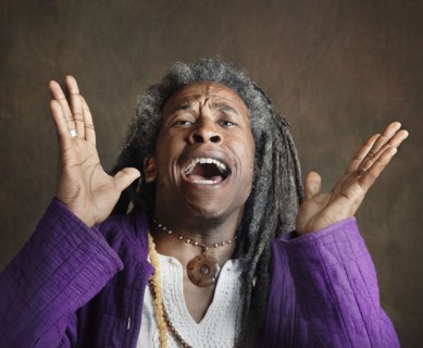 Exuberant African man with dreadlocks