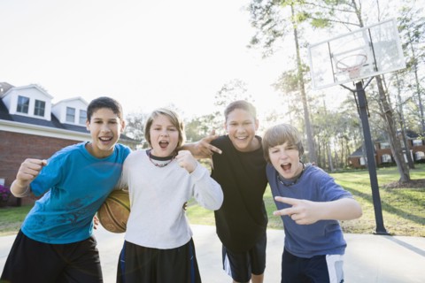 Boys playing basketball