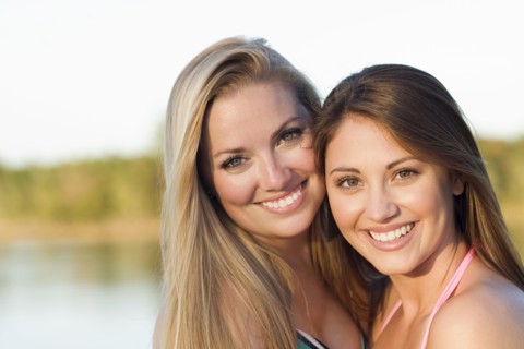 Caucasian women smiling outdoors