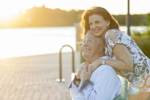 Older Caucasian couple smiling outdoors