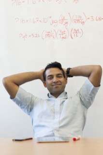 Asian businessman relaxing at desk