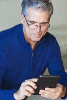 Caucasian businessman using digital tablet