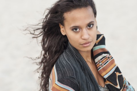 Mixed race woman wearing stylish sweater