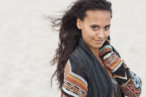 Mixed race woman wearing stylish sweater