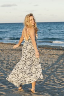 Caucasian woman walking on beach