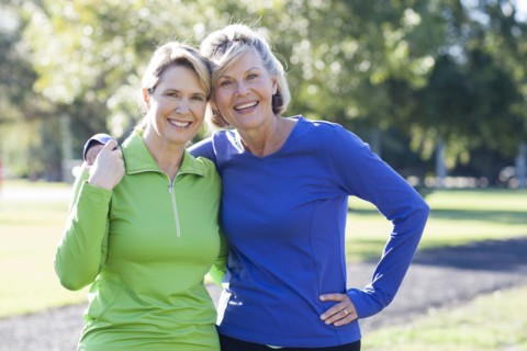 Caucasian women smiling in park