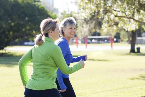 Caucasian women jogging in park
