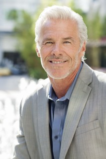 Caucasian businessman smiling in city
