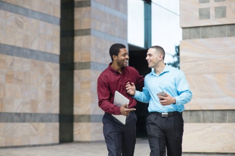 Businessmen talking outdoors